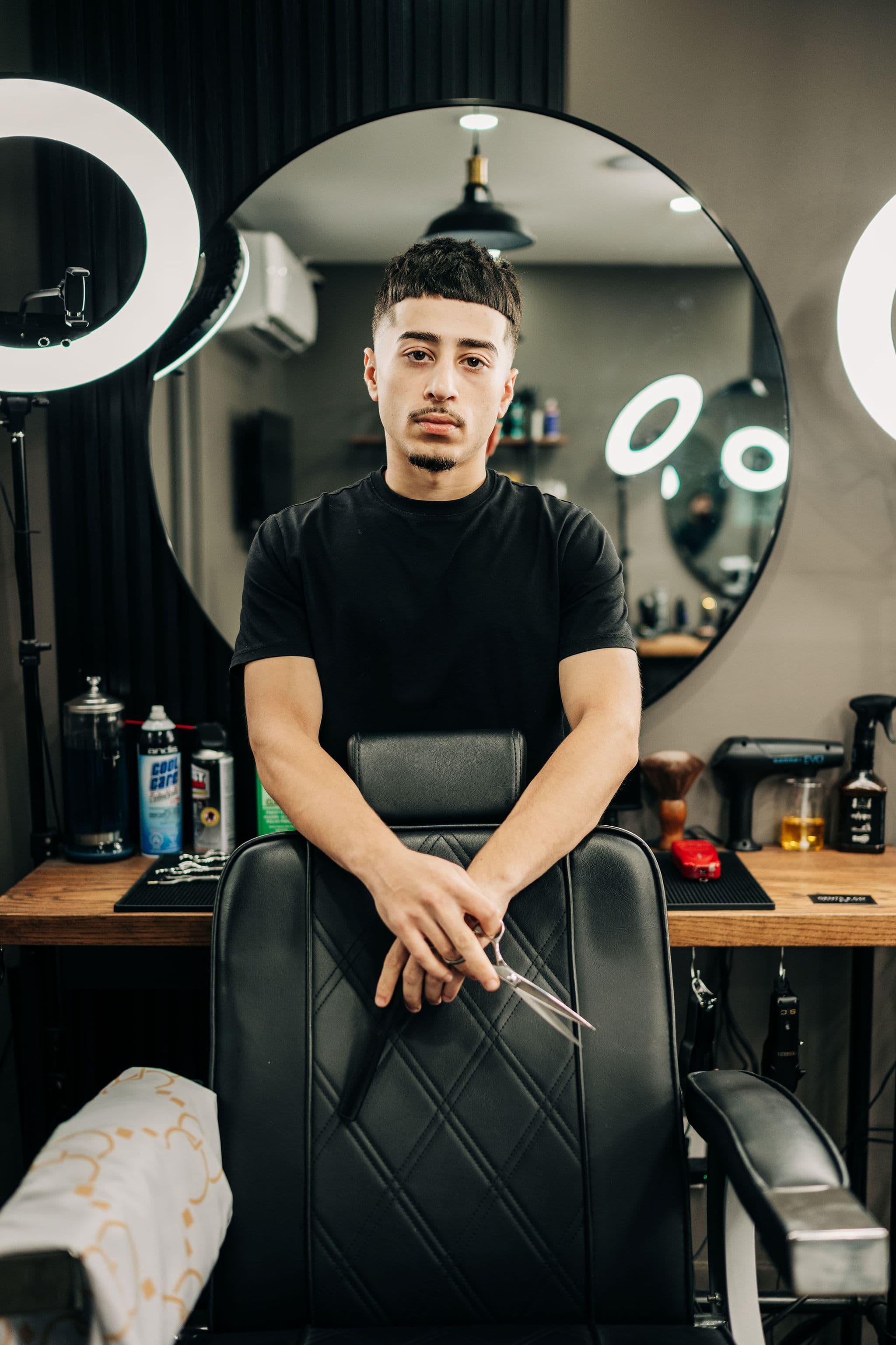 Portrait of Ramsin by their barber chair